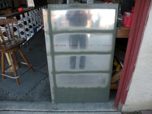 Right top inboard skin deburred, scuffed, cleaned, and primed.