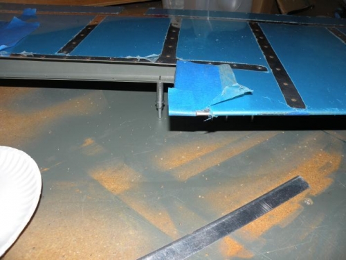 Tape used to (hopefully) get the JB Weld to form a radius at the trailing edge.