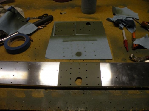 Aileron bracket reinforcement plates and rear spar prepped and primed.