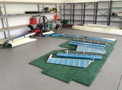 Everything else laid out on carpet we just pulled out of the house.