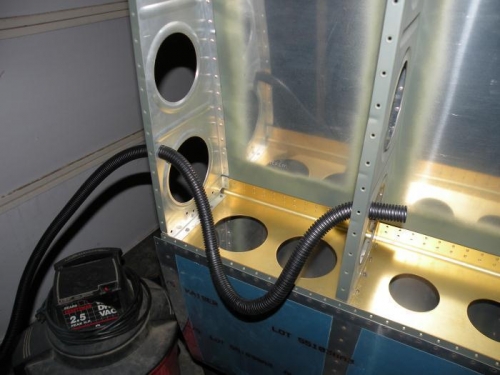 Beginning pulling of conduit in left wing. Tedious but doable...