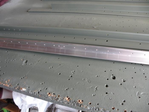 Main longeron scuffed and cleaned.