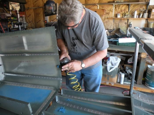 Dimpling the F-773 aft side skins for the F-770 forward side skins.