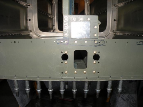 F-706B bottom bulkhead riveted to the F-728 and F-729 bellcrank ribs.