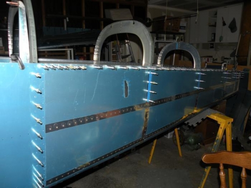 Both longerons drilled up to the F-706 bulkhead.