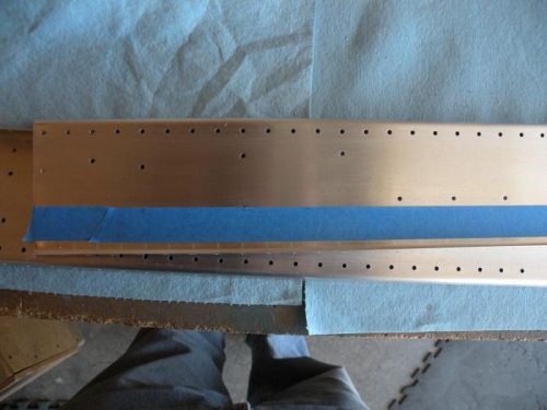 Inboard end prepped. Masking tape protects the web while dimpling the upper flange.