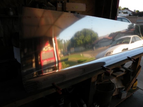 My setup to stabilize an aft side skin for deburring the top edge.