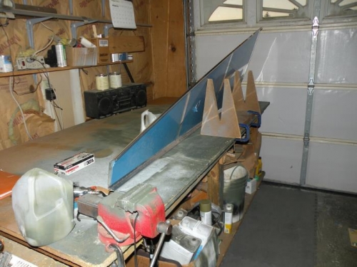 My setup to stabilize the aft bottom skin for edge deburring.