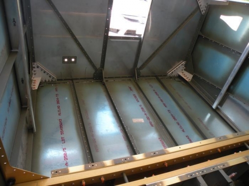 Forward bottom skin riveting is complete.