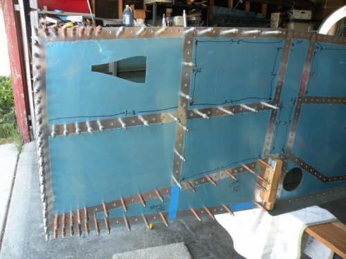Forward section of side skin ready to rivet.