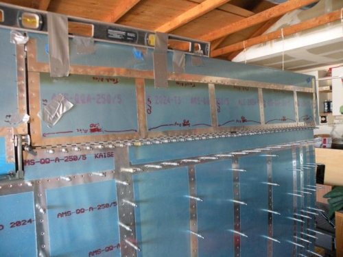 Left flap drilled to the wing.