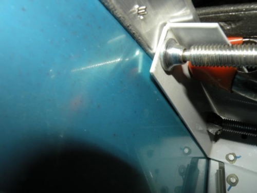 The fit of the upper left engine mount bracket to the longeron.