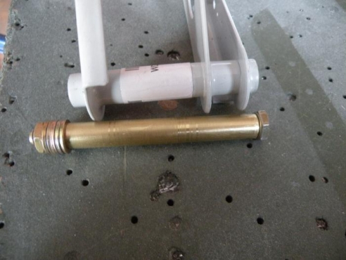 Shiny bands where the bellcrank is dragging on the bushing.