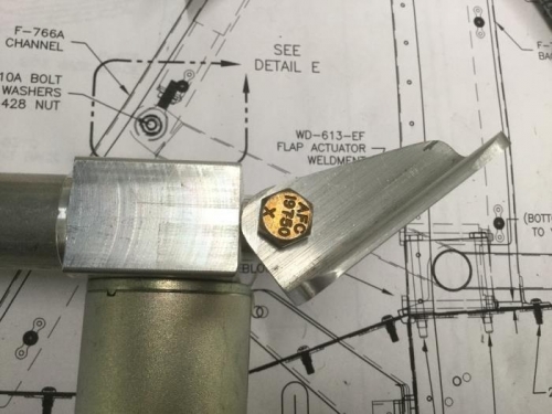 The radius on the F-766B actuator angle has to clear the gearbox housing on the actuator.