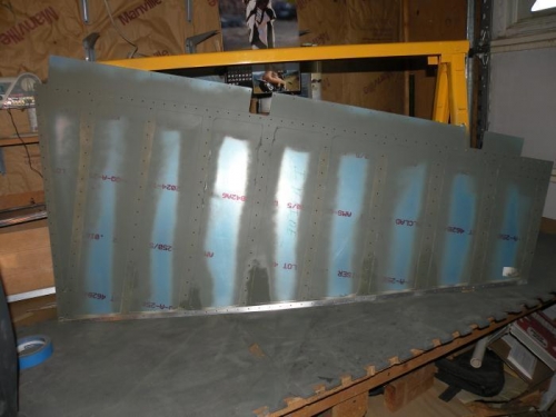 Primed right rudder skin. The dark patches are still wet.