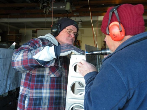 Wing rotated 180 degrees in the stand  for easier access to rear spar rivets.