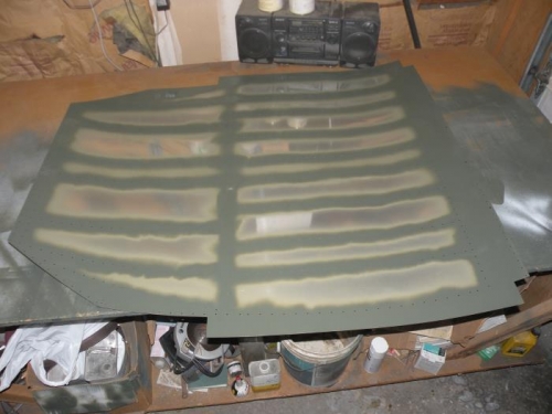 Center fuselage bottom skin priming complete.