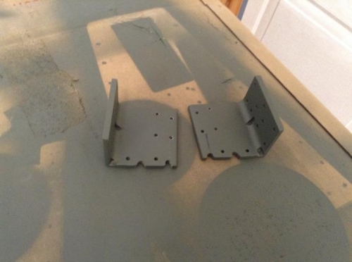 Canopy Latch Angles notched for skin rivet clearance