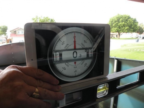 F-704 is 0.3 degrees, left side low.