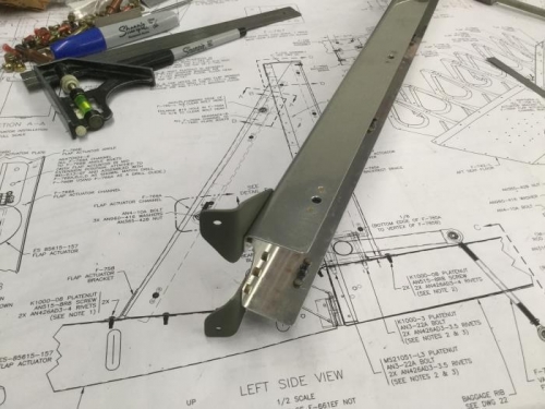 F-758 brackets and nutplates riveted to the flap motor channel.