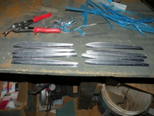 Eight stiffeners ready for final drilling to skin.