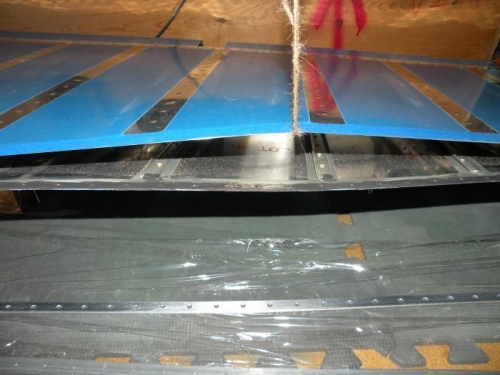 First layer of proseal applied to bottom skin trailing edge.