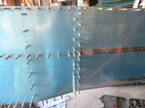 Match drilled the aft column of holes through the forward side skin into the aft side skin.