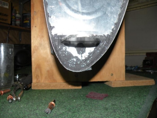 Fuselage attach bracket final riveted and sealed.