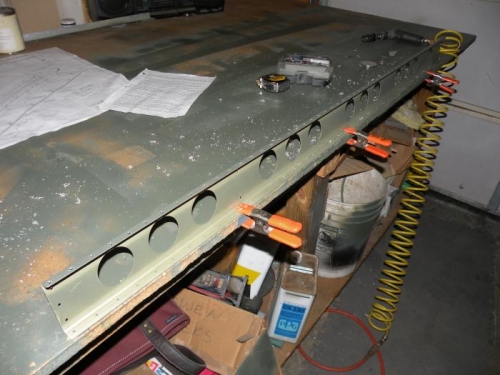 Bottom flange of left flap spar is countersunk.