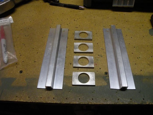 Drilled spacers and initial attach hole in tiedown bars.