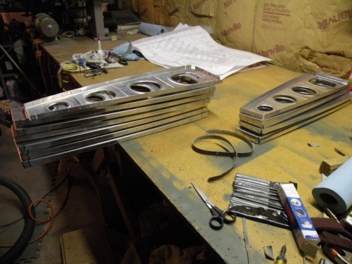 Seven out of 28 with the notches and small holes deburred.