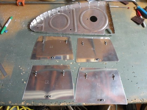 Capacitance plates drilled to ribs and nutplates attached.