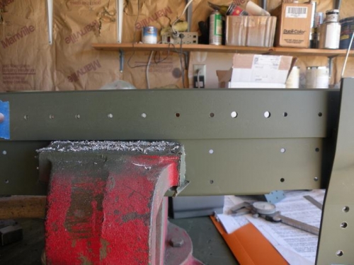 I managed to drill out the spar doublers without elongating the holes.