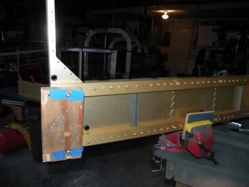 Forward half of the F-704 bulkhead removed for installation of the 6 AN4-12A bolts spec'd on Dwg 34.