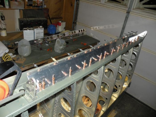 Aileron gap fairing clecoed in place and ready to rivet... finally.