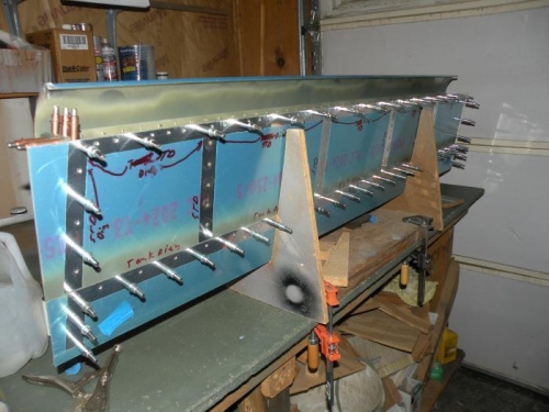 Left flap ready to rivet after removing the main spar for access.