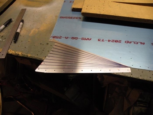 Reference lines marked on the inside of the left forward side skin.