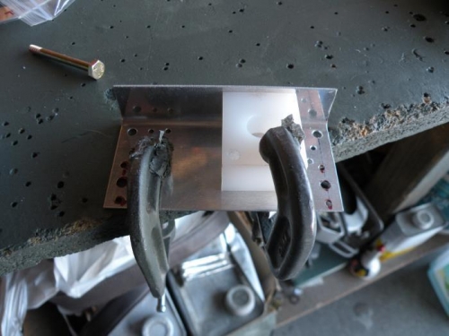 Drilling the bracket.