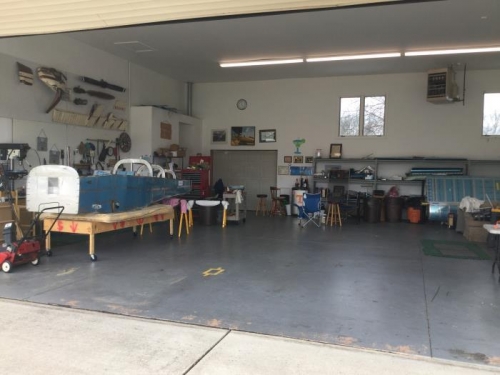 Wings back in the corner and fuselage by the workbench.