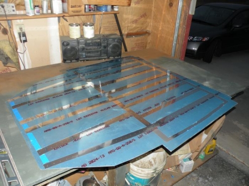 The de-vinyled F-776 center fuselage bottom skin, ready to be deburred (outside only) and dimpled.