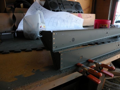 Root ribs flush riveted to both elevator spars.