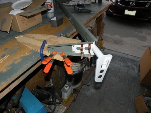 Riveting the WD-605-1-L elevator horn to the left elevator skeleton.