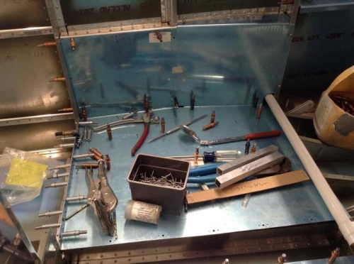 Left side forward baggae side cover fitted to the fuselage structure.