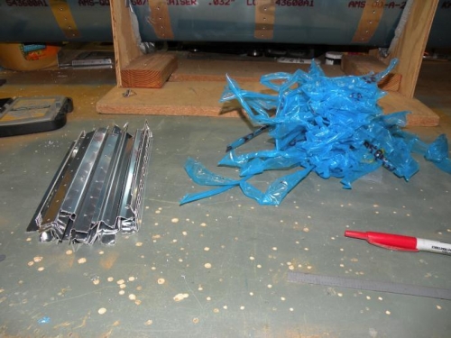 32 A-710 aileron stiffeners cut out, but not yet trimmed.