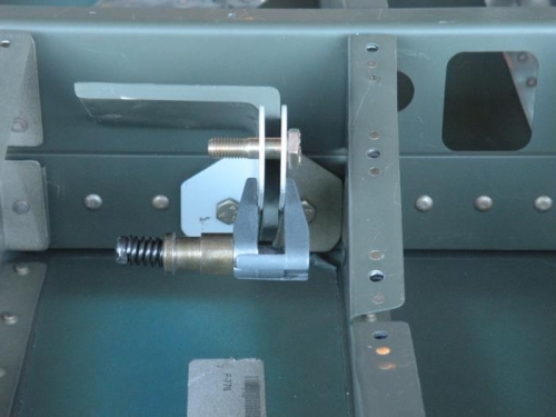 Setup for getting the seatbelt brackets properly positioned for final bolting.