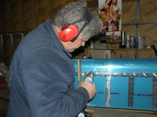 Riveting top of right aileron