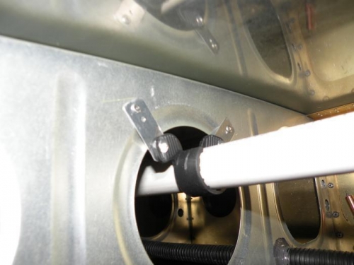 Closeup of an installed bracket in the left wing.