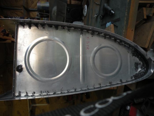 T-410 outboard end rib sealed and riveted.