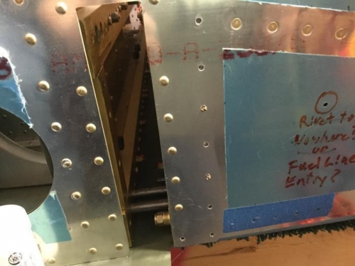 I missed the column of rivets when I installed the side skin.