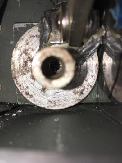 Checking alignment before enlarging to 1/4 inch.